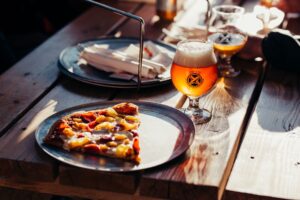 Pizza and beer on a table