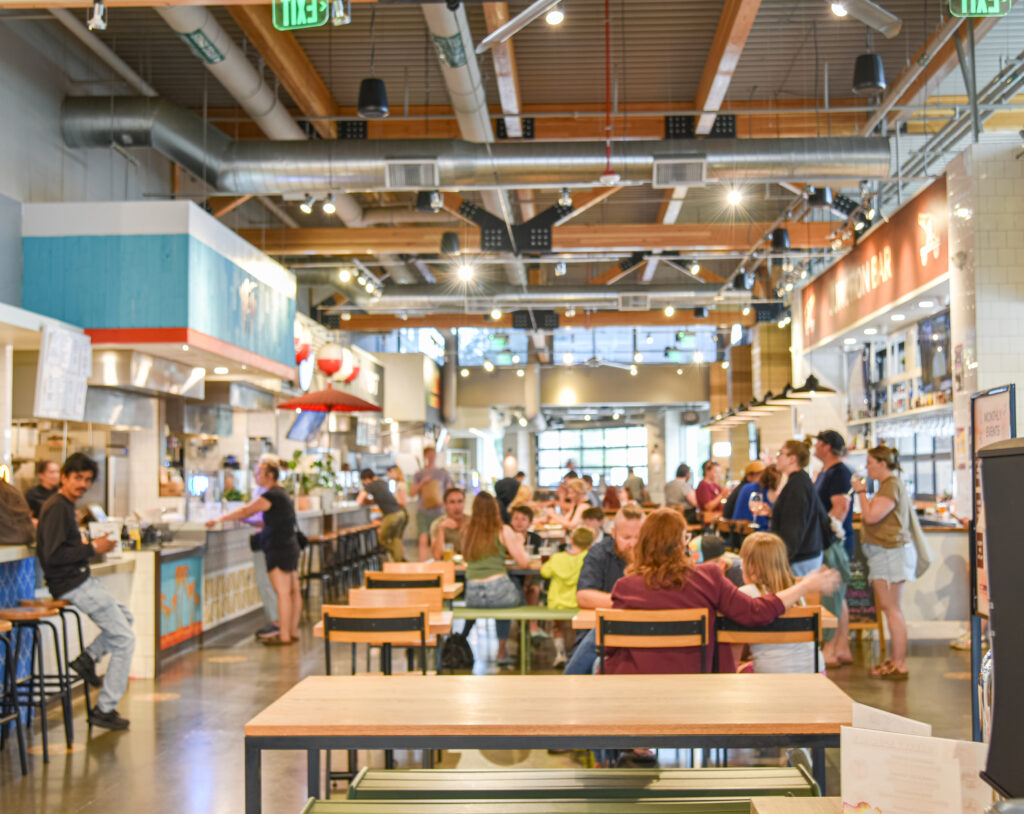 Bench-style tables at Junction Food Drink food market