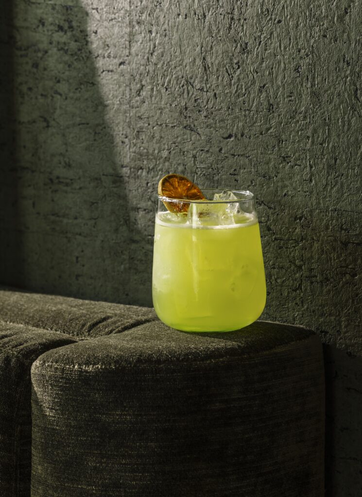 A photo of a cocktail at Populus Denver's Stellar Jay rooftop